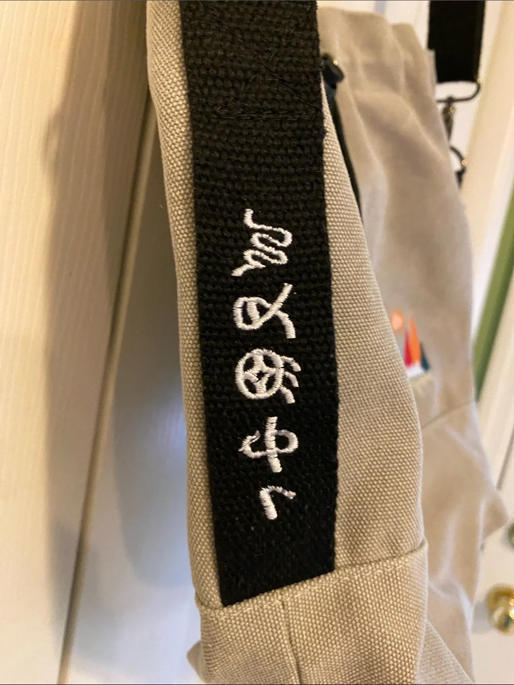 Gray Canvas Drawstring Tote with Embroidered Accent